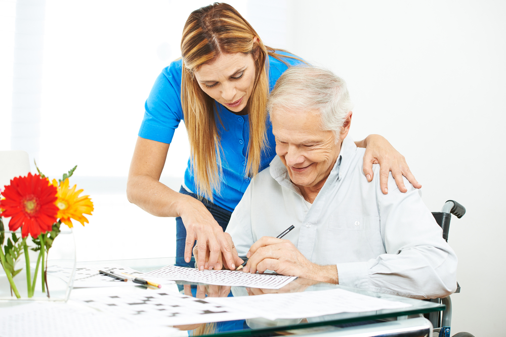 Older adult getting memory care assistance.