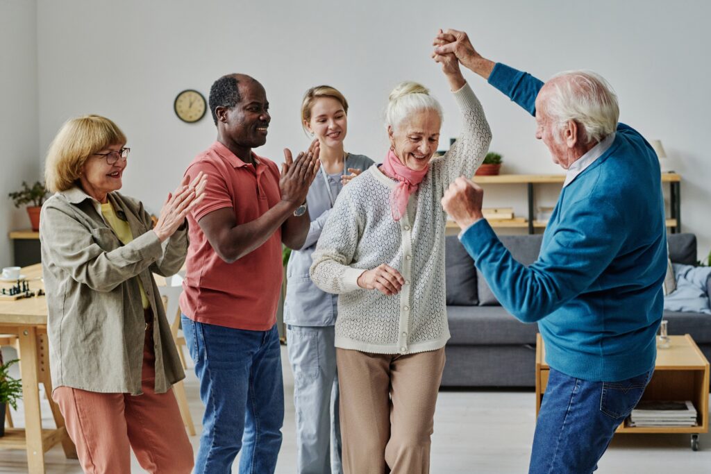 Group of senior people dancing together